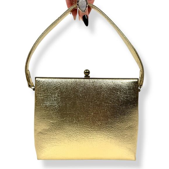 Vintage Handbags - 1960's gold faux leather kisslock top handle medium bag